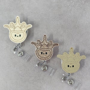 ベージュの脊椎格納式バッジホルダー、脊椎格納式バッジリール、脊椎格納式バッジホルダー、看護師格納式バッジホルダー