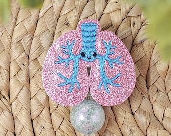 Porta credencial retráctil con forma de pulmón, de vinilo rosa brillante, para terapeutas respiratorios y enfermeros.