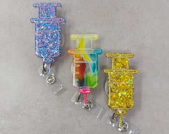 Badgehouder glitterhars, badgehouder spuit, badgehaspel spuit, badgehouder verpleegkunde, badgehouder pediatrie