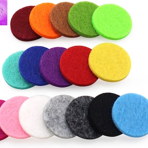 Könnte beinhalten: Sortiment von 15 Filz-Diffusor-Pads in verschiedenen Farben, darunter Türkis, Blau, Lila, Rot, Gelb, Grün, Orange, Braun, Rosa, Weiß, Grau und Schwarz.