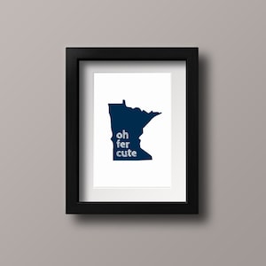 May include: A black framed print featuring a blue silhouette of the state of Minnesota with the text "oh fer cute" inside the silhouette.