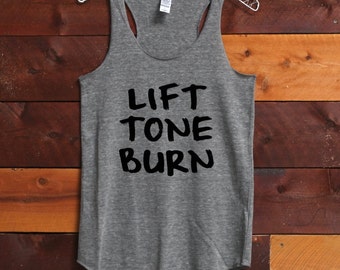 May include: Gray tank top with the text "Lift Tone Burn" printed in black.