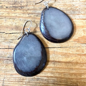 Gorgeous grey disc Tagua nut (vegetable Ivory) dangle earrings with sterling silver wires .