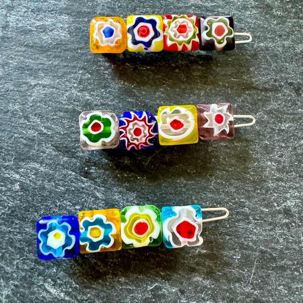 Confezione di tre perle di vetro Millifiore fermacapelli.