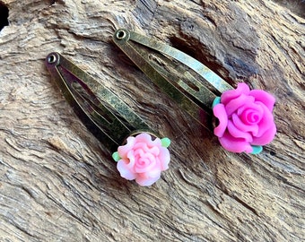 A pair of pink rose  Hair clips