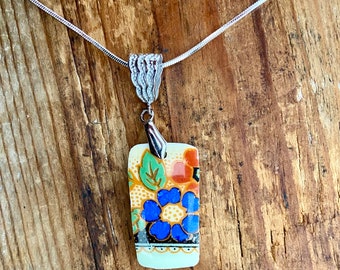 Floral  pretty blue ceramic recycled into a beautiful pendant on sterling silver snake 22 inch chain.