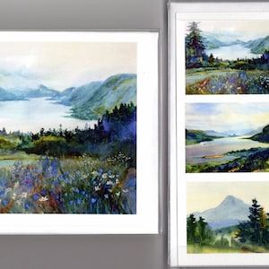 May include: A set of six watercolor paintings depicting scenic landscapes with mountains, rivers, and forests. The paintings are framed and ready to hang.