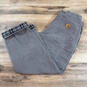 Pantalones vaqueros CARHARTT vintage Y2K, ropa de trabajo, ropa de trabajo utilitaria, pantalones cargo anchos y holgados con forro de franela a cuadros de lona de pato para carpintero