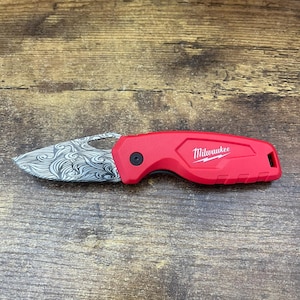 Engraved Milwaukee Compact knife