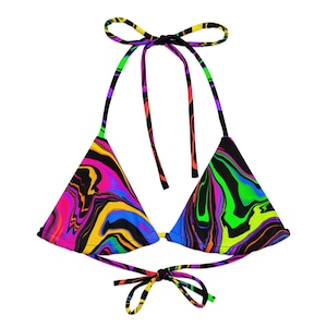 May include: A colorful bikini top with a vibrant, swirling pattern in shades of pink, yellow, blue, green, and black. The triangle top has tie closures at the neck and back, and is designed for swimwear.