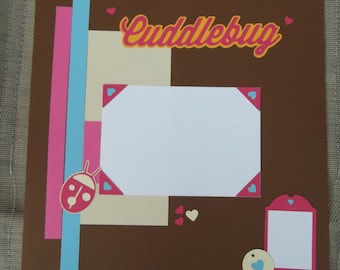 Baby page"Cuddlebug"; child page; 12x12 scrapbook page; lady bug; brown, pink and blue