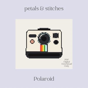 May include: A pixelated illustration of a Polaroid camera with a rainbow stripe. The camera is cream-colored with black details and the text "petals & stitches" at the top and "Polaroid" at the bottom. The image also includes the text "PDF Digital Download Only".