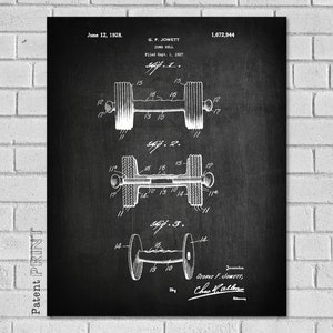 May include: Black and white patent drawing of a dumbbell design. The drawing shows three different views of the dumbbell. The patent number 1,672,944 and the date June 12, 1928 are visible at the top of the drawing. The inventor's name, G. F. Jowett, is also visible.