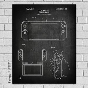 May include: A black and white patent drawing of a video game controller. The drawing shows the controller in different configurations, including a handheld mode and a detached mode. The patent number is US 9,724,601 B2. The patent date is August 8, 2017. The patent is for a game controller, and the assignee is Nintendo Co., Ltd.