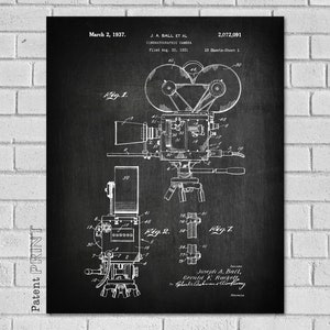 May include: Black and white patent drawing of a vintage film camera. The drawing shows the camera in detail, including the lens, film reels, and tripod. The patent number 2,072,091 is visible at the top of the drawing. The text "March 2, 1937" and "J.A. Ball et al" are also visible.