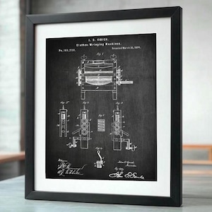May include: A black and white vintage patent drawing of a clothes wringing machine. The patent number is 140,200 and the patent date is March 31, 1874. The drawing shows the machine in detail, with all of its parts labeled.