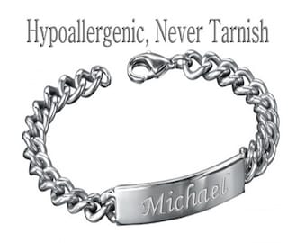 May include: A silver chain bracelet with a personalized nameplate engraved with the name "Michael".