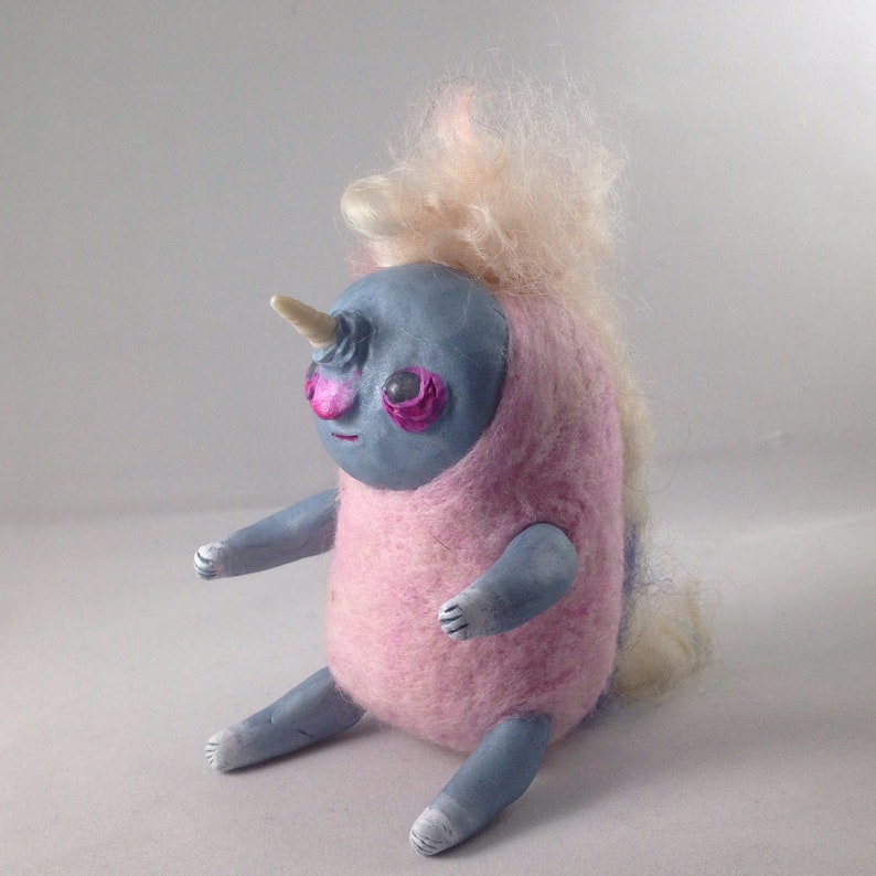 creepy unicorn toy