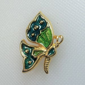 Adorável broche vintage dourado azul e verde esmaltado borboleta figural broche assinado por Hedy no cartão de vendas original