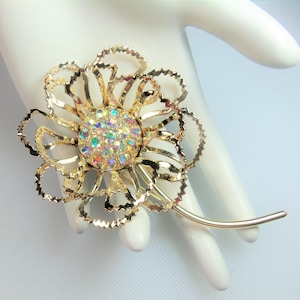 Vintage Polished Gold Tone Open Leaf Flower Pin Brooch w Aurora Borealis Rhinestone Cluster Center Signed Sarah Coventry Circa 1968 Allusion