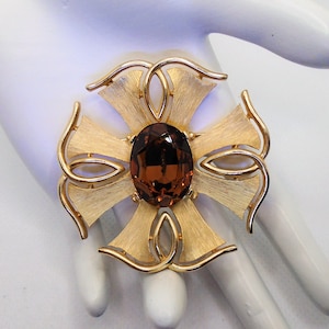 Vintage Textured and Polished Gold Tone with Brown Topaz Oval Rhinestone Center Maltese Cross Pin Brooch Designer Signed Crown Trifari