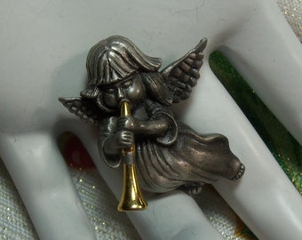 Adorable vintage Christmas angel Pewter angel girl blowing a gold tone trumpet signed Daria designer brooch