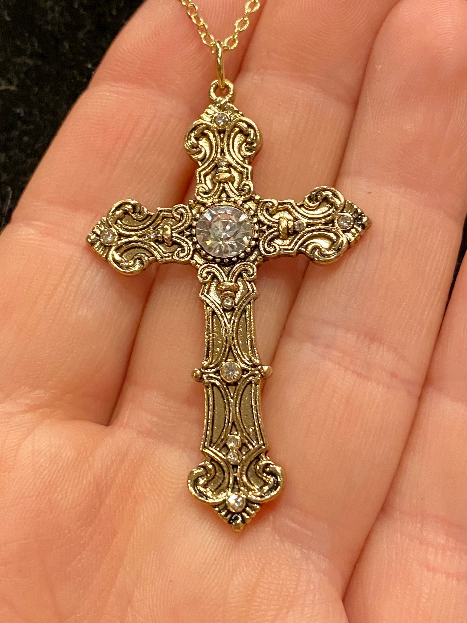 Gold rhinestone cross best sale necklace