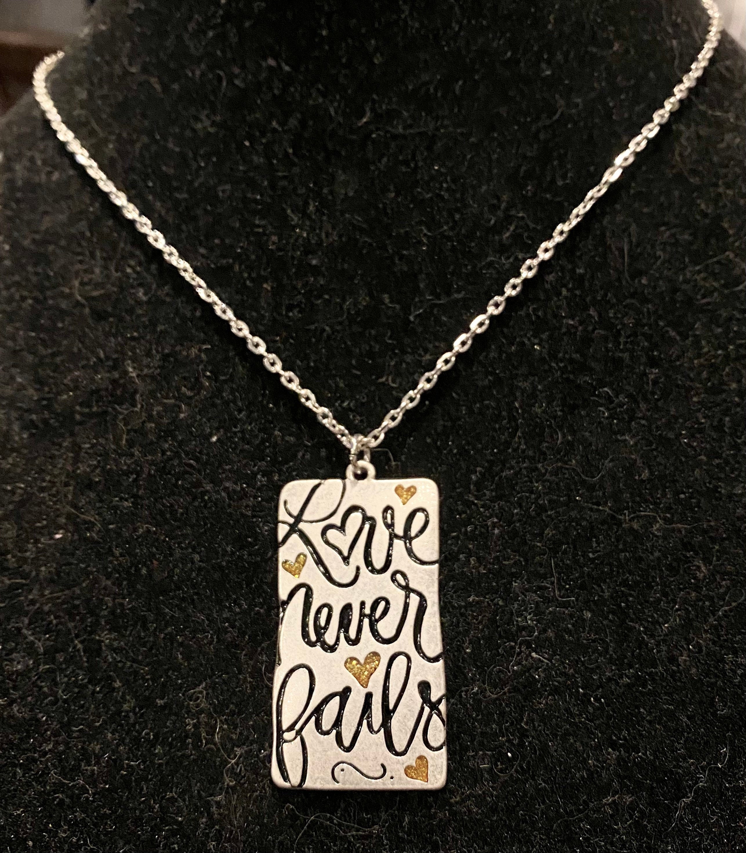 Love never fails necklace deals