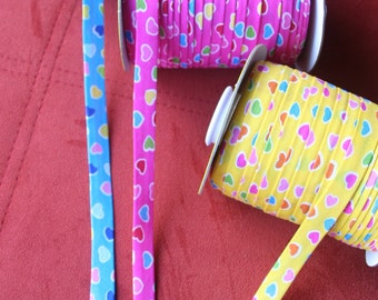 3.00 m inclined tape 14 mm hearts, colors yellow