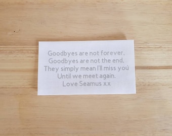 May include: White card with a message that reads: "Goodbyes are not forever. Goodbyes are not the end. They simply mean I'll miss you Until we meet again. Love Seamus xx"