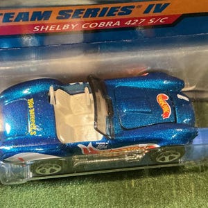 Hot Wheels Race Team Serie IV Blue Shelby Cobra 427 S/C DieCast 1/64 Scale