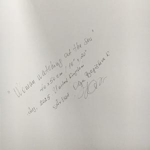 May include: Handwritten text on a white surface. The text reads "Woman watching at the Sea" with dimensions of 16" x 20". Additional text includes the artist's name, date, and location.
