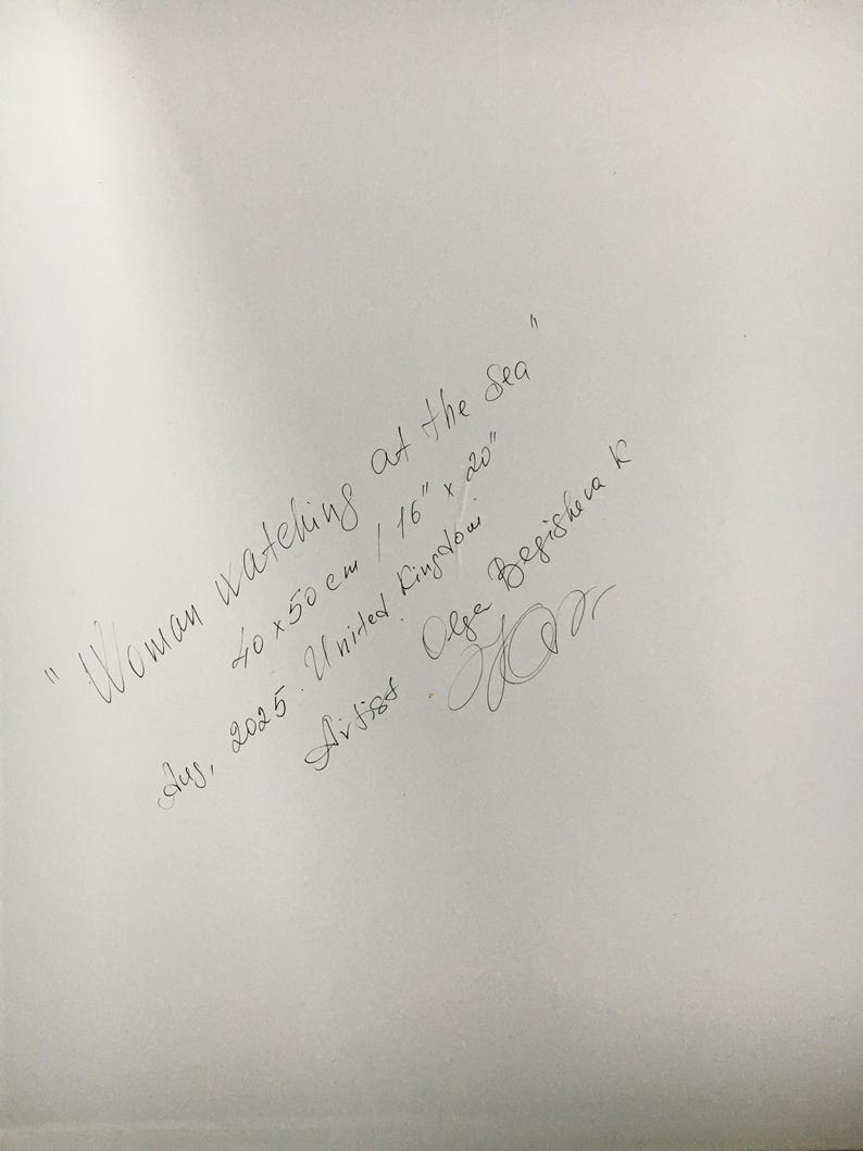 May include: Handwritten text on a white surface. The text reads "Woman watching at the Sea" with dimensions of 16" x 20". Additional text includes the artist's name, date, and location.