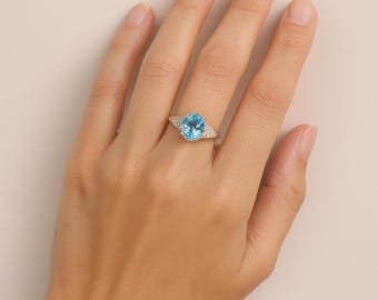 Anillo de plata de ley con piedra preciosa de topacio azul