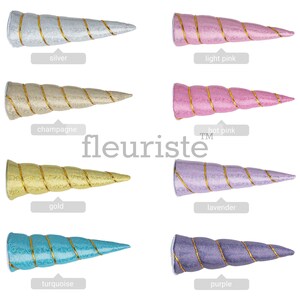 May include: Set of ten unicorn horn headbands in various colors, including silver, light pink, champagne, hot pink, gold, lavender, turquoise, and purple. Each headband features a spiral design.