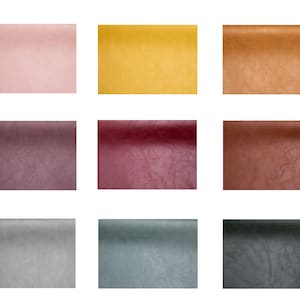 May include: Nine fabric swatches in different colors and textures. The swatches are arranged in three rows of three. The colors are pink, yellow, brown, burgundy, red, orange, gray, blue, and black.