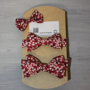 ceremonial box of 3 bow ties, including 2 children's bows and one adult bow, as well as 2 girls' barrettes. image 2