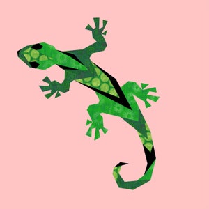 Könnte beinhalten: Ein grünes Gecko mit geometrischem Muster, mit schwarzem Umriss, auf rosa Hintergrund.