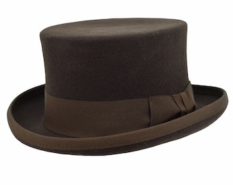 May include: A brown felt top hat with a brown grosgrain ribbon and bow.