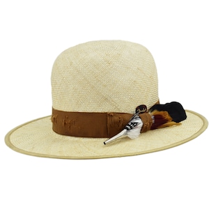 May include: A natural straw fedora hat with a brown ribbon band and a feather accent. The feather is black, red, and white with a silver pin.