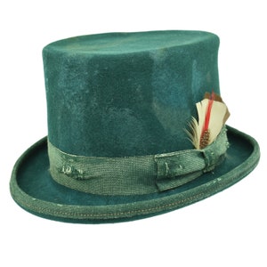 May include: A teal green top hat with a distressed look and a brown and red feather accent.