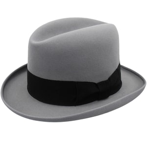 May include: A gray fedora hat with a black ribbon around the crown.