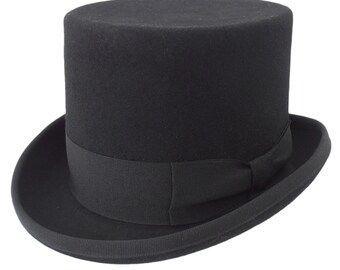 May include: A black top hat with a black ribbon. The hat is made of felt and has a tall, cylindrical crown.