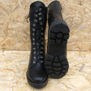 Lace up black leather combat boots with fur for women. Military winter shoes. Autumn boots girl. Black women shoes. Snow boots natural fur.