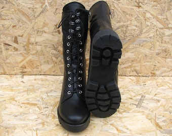 Lace up black leather combat boots with fur for women. Military winter shoes. Autumn boots girl. Black women shoes. Snow boots natural fur.