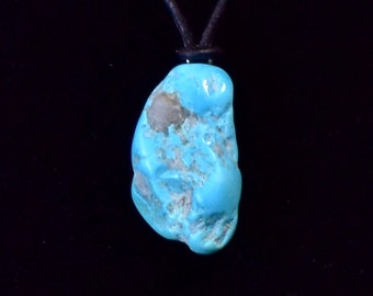 Price cut.  Pendant, High Grade Sleeping Beauty Turquoise nugget/ quartz inclusions,  Natural Amazing Blues, hand polished, old stock