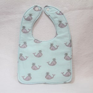 Whales on a teal Infant bib soft extra absorbent flannel w/ fleece batting filling