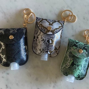 3 Keychain-Hand Sanitizers, pack of 3(white, black, green), Animal Print Design