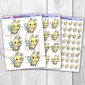 May include: A set of bee-themed stickers in various sizes. The stickers feature a cartoon bee holding a stack of colorful papers. The stickers are available in three sizes: medium, small, and tiny. The text "Mischa Bee" and "JlynnPaperCo.com" are visible on the sheet.