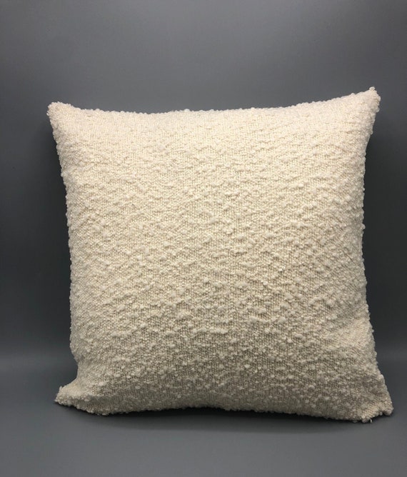 Handmade contemporary pillow with boucle cream fabric and cream vinyl in the back 17 x 17" inches